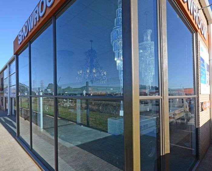 store with fixed panel aluminium window frames